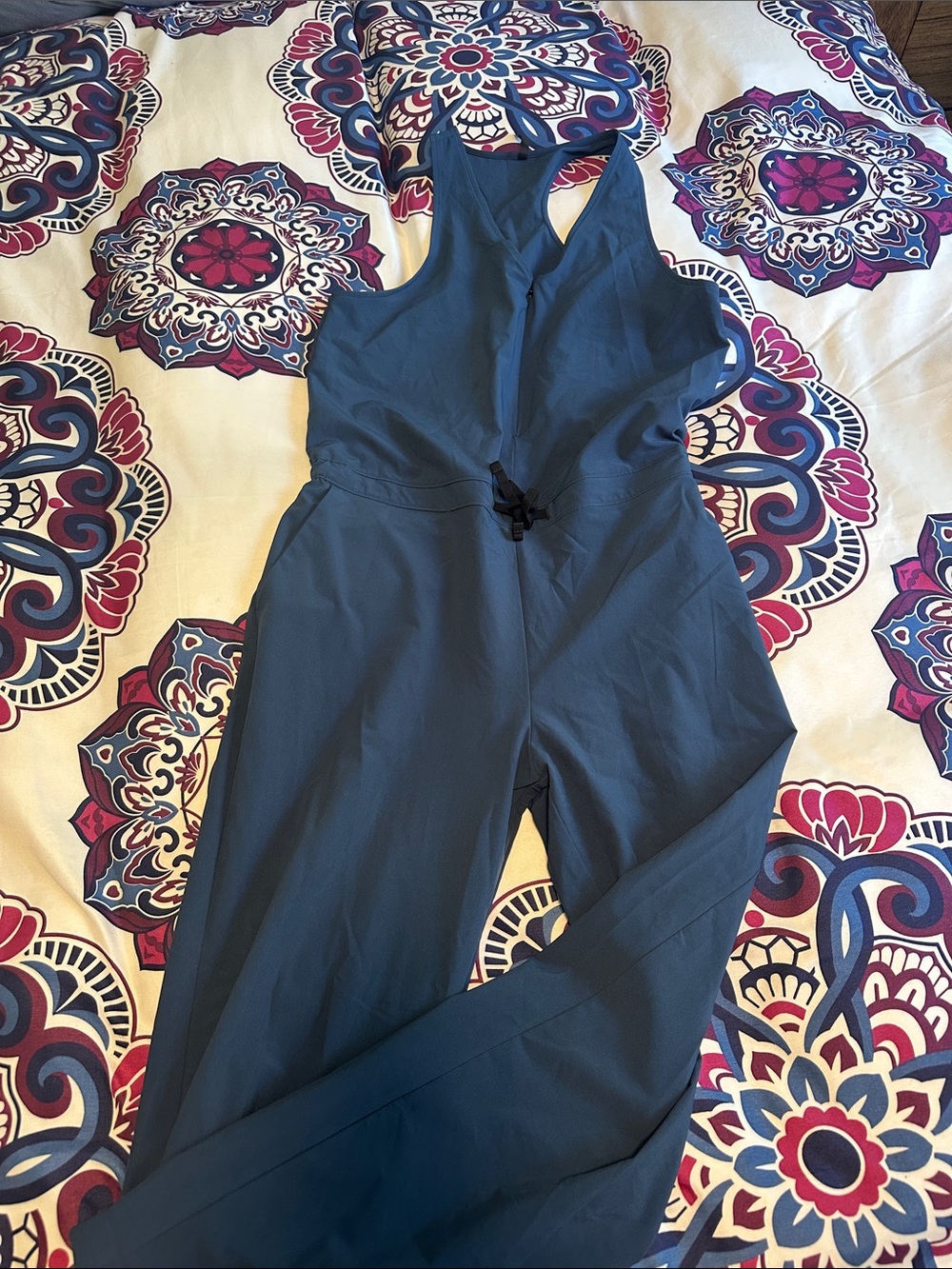 Sleeveless Navy Blue Wide-Leg Jumpsuit with Adjustable Waist Tie